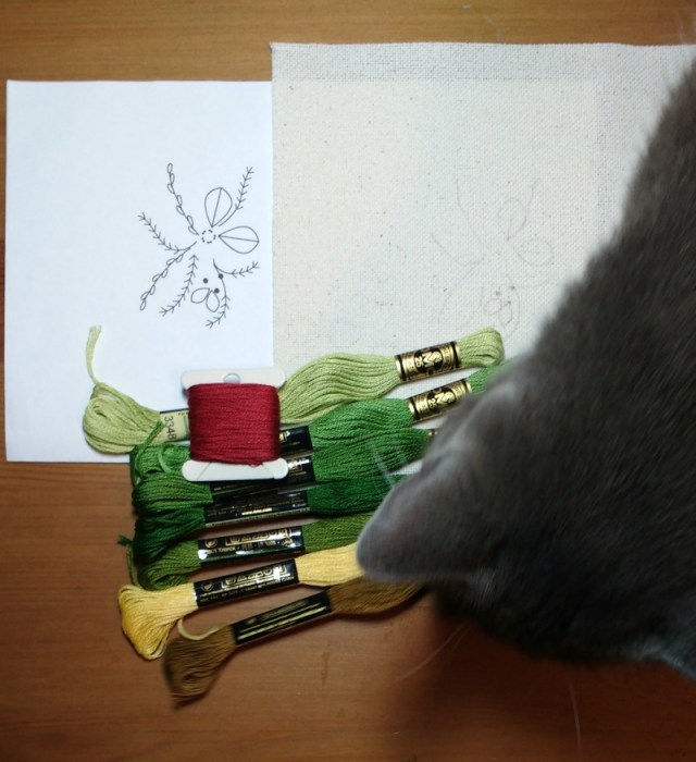 Chi checks out the embroidery threads