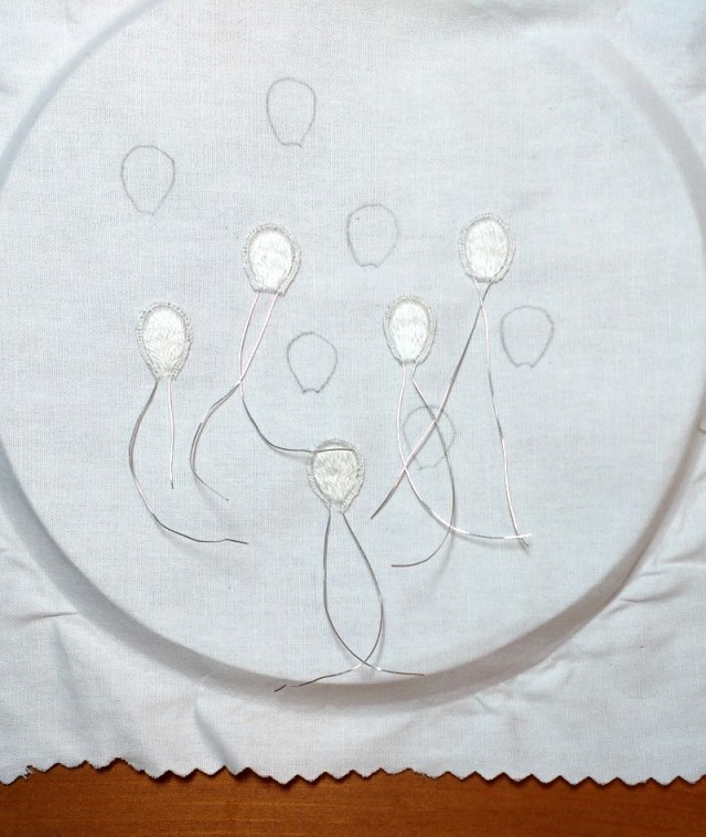 flower petals stitched on embroidery project