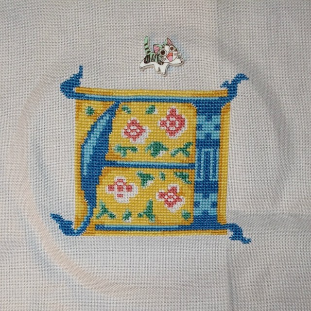 medieval-style cross-stitch letter A progress