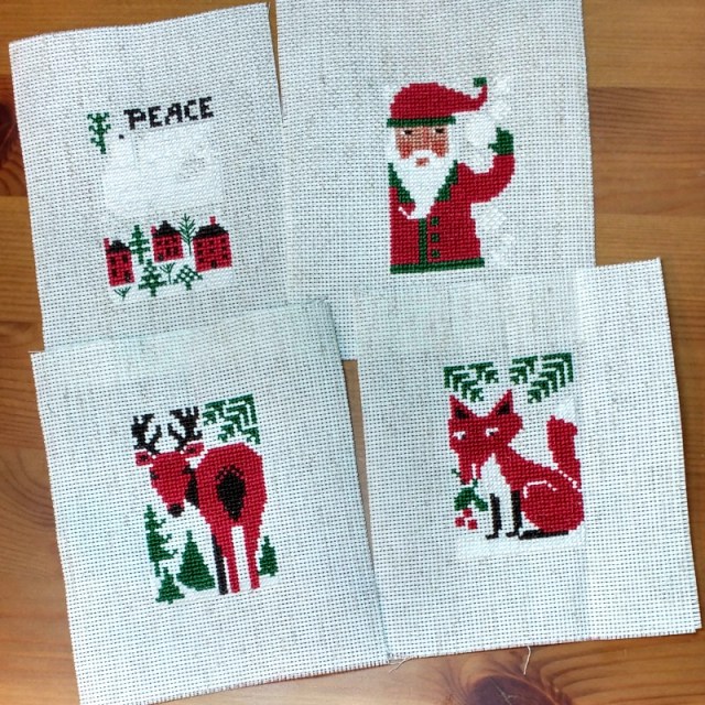 four Prairie Schooler Evergreen Christmas ornaments